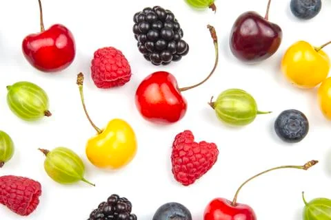 Assorted fresh different berries on a white background. useful vitamin health Stock Photos