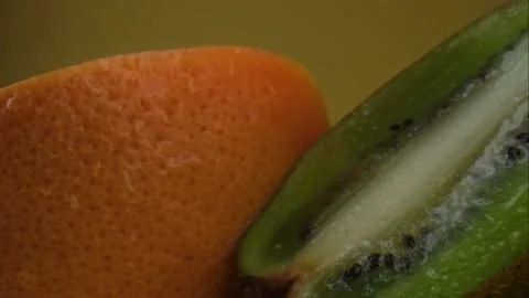 Assorted fresh fruit, grapefruit,splashes of water on fruit, fresh juice Stock Footage 131603461