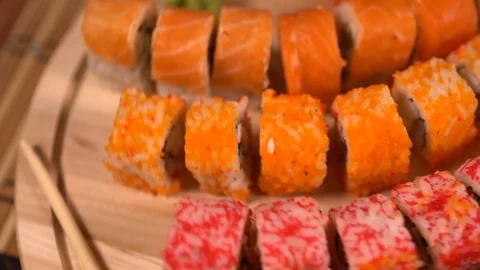 Assorted fresh sushi rolls in a sushi bar Stock-Footage 96337322
