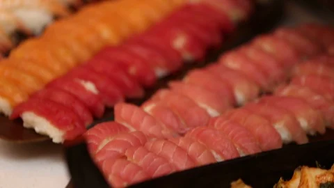 Assorted fresh sushi sashimi and rice on buffet 1 Stock Footage 123874728