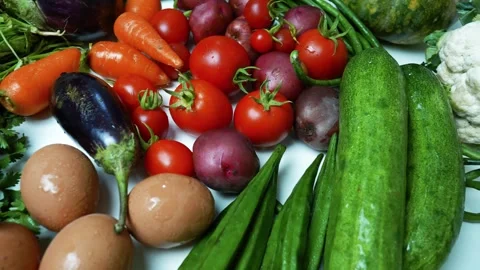 Assorted Fresh Vegetables and Eggs, A colorful assortment of fresh vegetabl.. Stock Footage 305032158