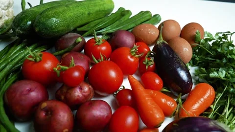 Assorted Fresh Vegetables and Eggs, A colorful assortment of fresh vegetabl.. Vídeos de archivo 305032208