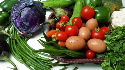 Assorted Fresh Vegetables and Eggs, A colorful assortment of fresh vegetabl.. Stock Footage 305032721