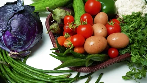 Assorted Fresh Vegetables and Eggs, A colorful assortment of fresh vegetabl.. Stockbeeldmateriaal 305032796