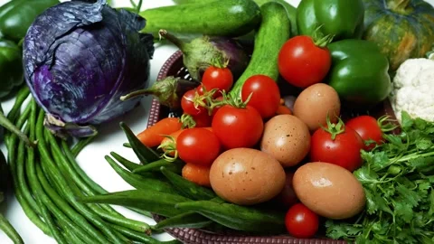 Assorted Fresh Vegetables and Eggs, A colorful assortment of fresh vegetabl.. 動画素材 305032892