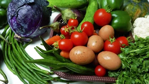 Assorted Fresh Vegetables and Eggs, A colorful assortment of fresh vegetabl.. 動画素材 305032921