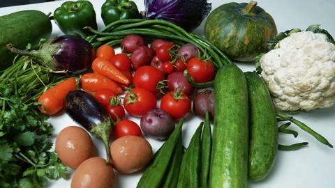 Assorted Fresh Vegetables and Eggs, A colorful assortment of fresh vegetabl.. Stock Footage 305033905