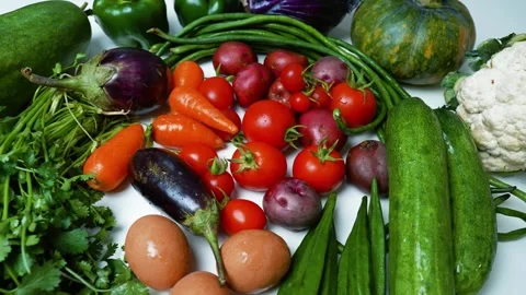 Assorted Fresh Vegetables and Eggs, A colorful assortment of fresh vegetabl.. Vídeo Stock 305033949