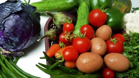 Assorted Fresh Vegetables and Eggs, A colorful assortment of fresh vegetabl.. Stock Footage 305038948