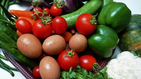 Assorted Fresh Vegetables and Eggs, A colorful assortment of fresh vegetabl.. 動画素材 305038967