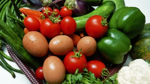 Assorted Fresh Vegetables and Eggs, A colorful assortment of fresh vegetabl.. Vídeos de archivo 305038996