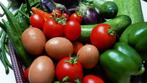 Assorted Fresh Vegetables and Eggs, A colorful assortment of fresh vegetabl.. Vídeos de archivo 305039049