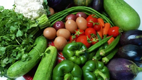Assorted Fresh Vegetables and Eggs Footage, A colorful assortment of fresh .. 库存影片 305039510