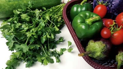 Assorted Fresh Vegetables in a Basket, A variety of fresh vegetables includ.. Stock Footage 305029427