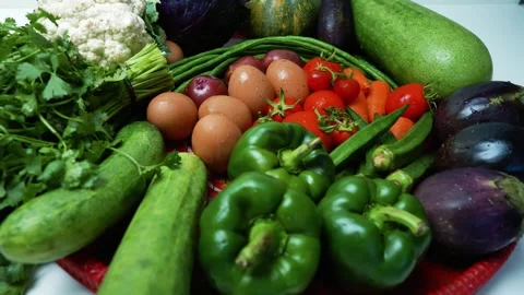 Assorted Fresh Vegetables on Red Tray, A colorful assortment of fresh veget.. Stock Footage 305038846