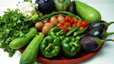 Assorted Fresh Vegetables on Red Tray Footage, A colorful assortment of fre.. Stock Footage 305039576