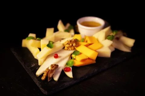 Assorted fruit on a black background Stock Photos