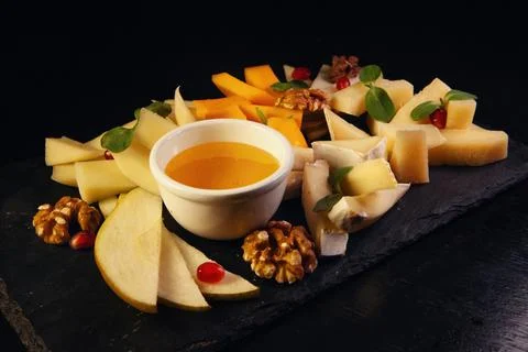 Assorted fruit on a black background Stock Photos