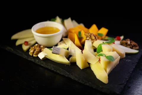 Assorted fruit on a black background Stock Photos