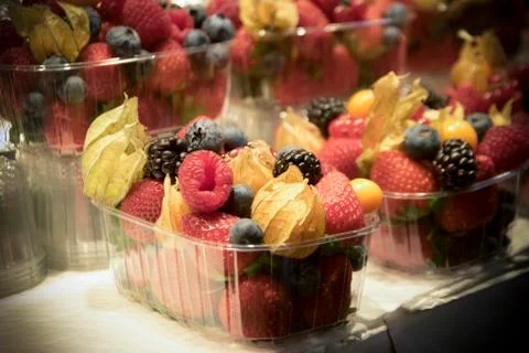 Assorted Fruit in Plastic Boxes Stock Photos