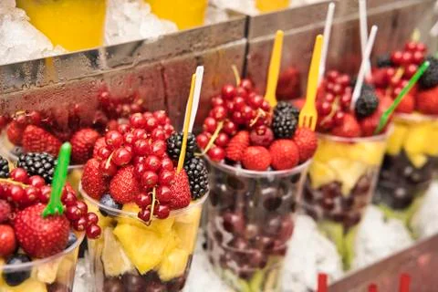 Assorted fruit salad in a plastic cup. Stock Photos