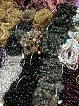Assorted gemstone bead bracelets in vibrant colors Stock Photos