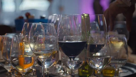 Assorted Glassware Cleared Off Table Stock Footage 206994636