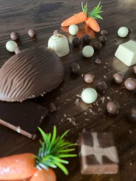 Assorted Gourmet Chocolates and Easter Decorations Stock Photos