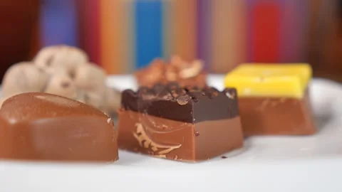 Assorted gourmet chocolates macro view with close up of dark and milk choco.. Stock Footage 332259058