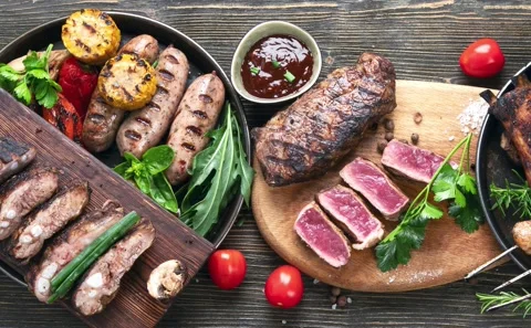Assorted grilled meat with vegetables Stock Footage 165640014