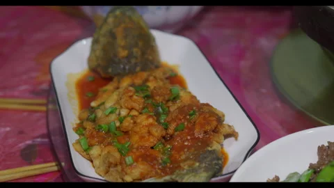 Assorted Hakka dishes on rotating dining table, close-up, no people Stock Footage 329764634