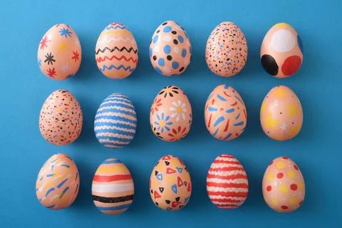 Assorted Hand-Painted Easter Eggs Flat Lay Stock Photos
