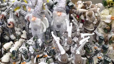 Assorted Handmade Christmas Figurines Displayed at Seasonal Holiday Market Stock Footage 323795993