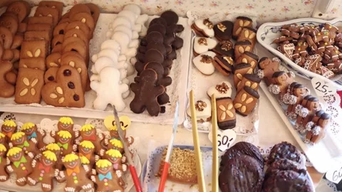 Assorted handmade gingerbread cookies with chocolate icing nuts and colorful dec Stock Footage 318869596