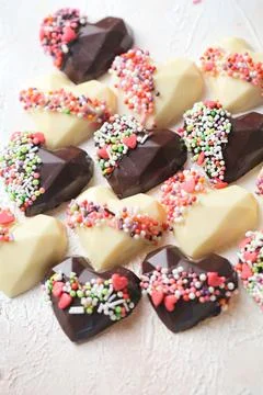 Assorted Heart-Shaped Chocolates Arranged on a Table Stock Photos