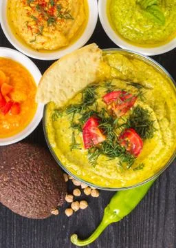 Assorted hummus with vegetables Stock Photos