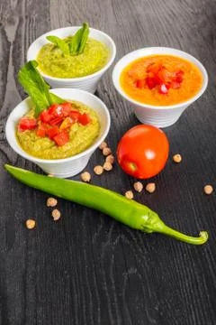 Assorted hummus with vegetables Stock Photos