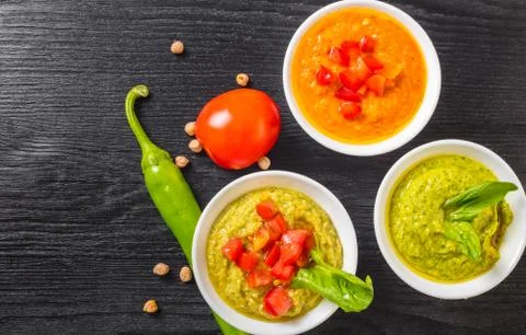 Assorted hummus with vegetables Stock Photos