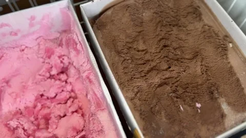 Assorted ice cream flavors in boxes with creamy texture Stock Footage 314708159