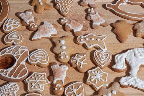Assorted iced gingerbread cookies shaped like hearts, stars, trees and litt.. Stock Photos