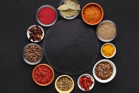 Assorted indian spices in circle with space for text 写真素材