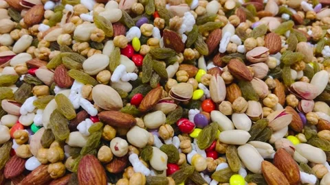 Assorted Iranian trail mix with nuts, raisins and sweets, horizontal Stock Footage 345156318