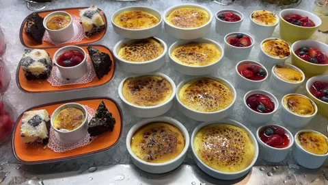 Assorted Italian Desserts Displayed Chilled On Ice At Buffet Stock Footage 343660940
