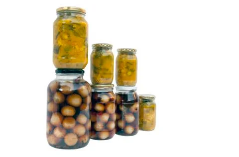 Assorted jars of homemade piccalilli and pickled onions Stock Photos