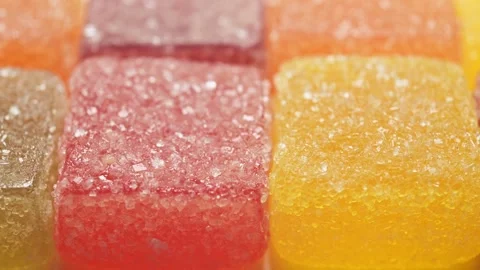 Assorted jelly candies extreme close up with panning. Video stock 277871304