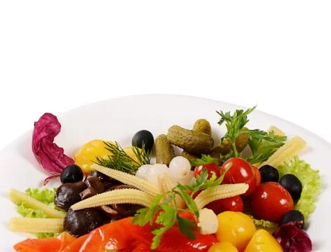 Assorted marinated vegetables and mushrooms Stock Photos