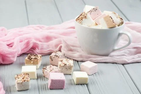 Assorted marshmallow on a gray table Stock Photos