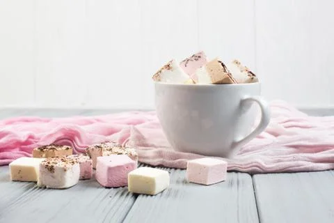 Assorted marshmallow on a gray table Stock Photos