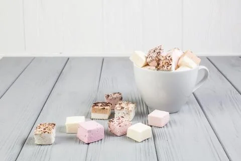 Assorted marshmallow on a gray table Stock-Fotos