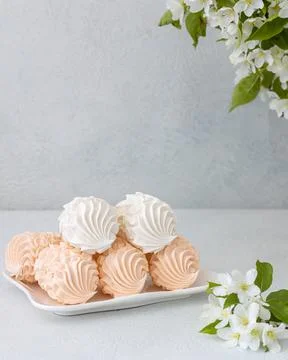 Assorted marshmallows for breakfast with a cup of fragrant coffee Stock Photos